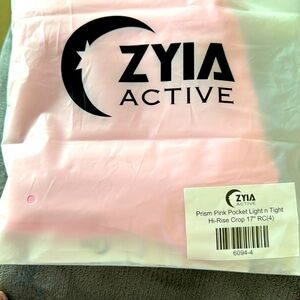 PRISM PINK POCKET LIGHT N TIGHT HI RISE CROP 17” size 4